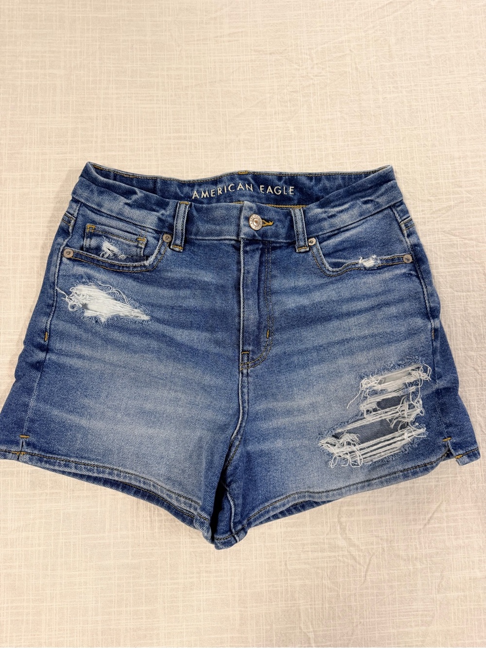 American Eagle Outfitters High-Rise Distressed Denim Shorts - Blue size 4